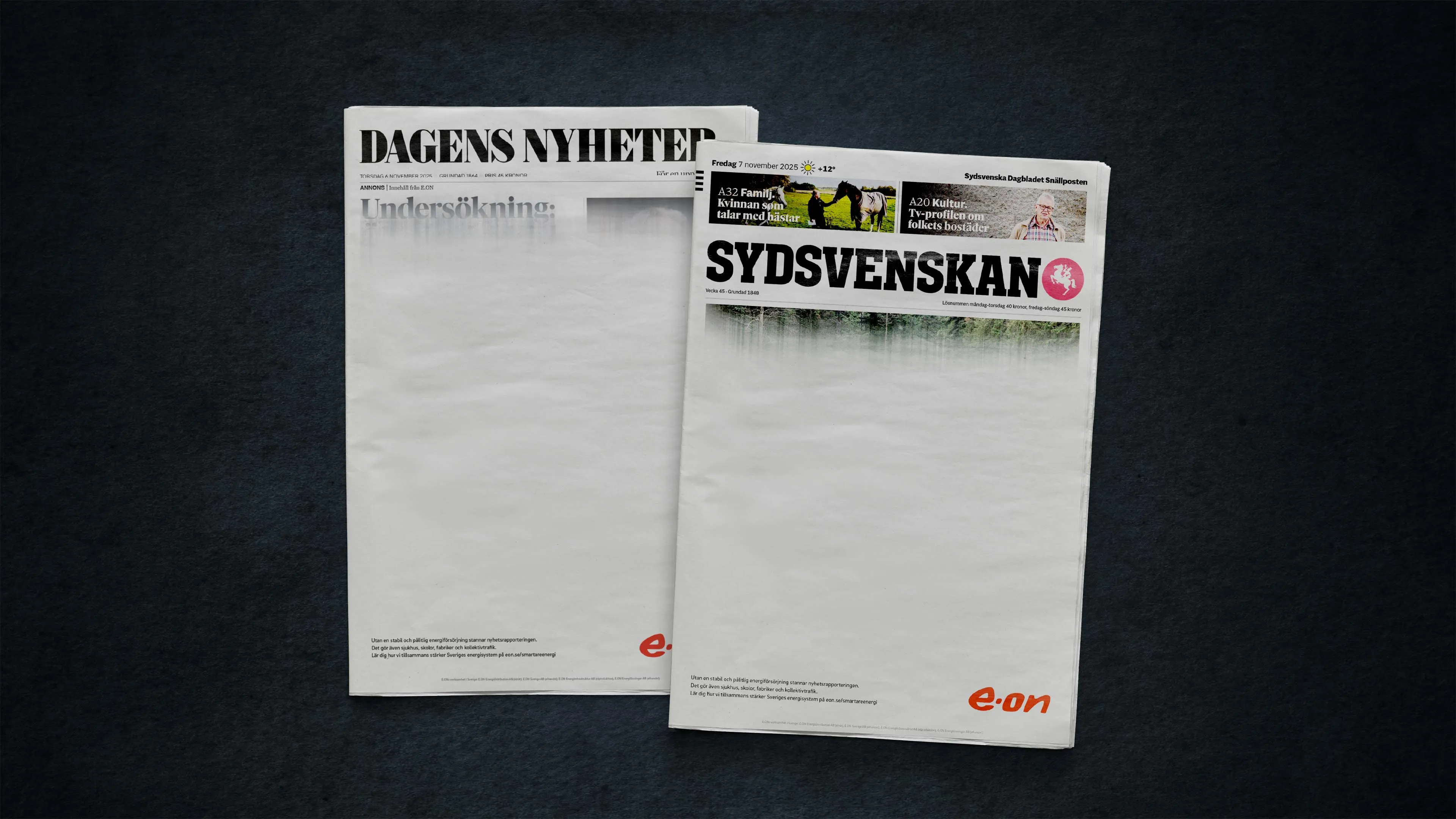 Two newspapers, Dagens Nyheter and Sydsvenskan, with mostly blank front pages and small E.ON logos at the bottom right corners.