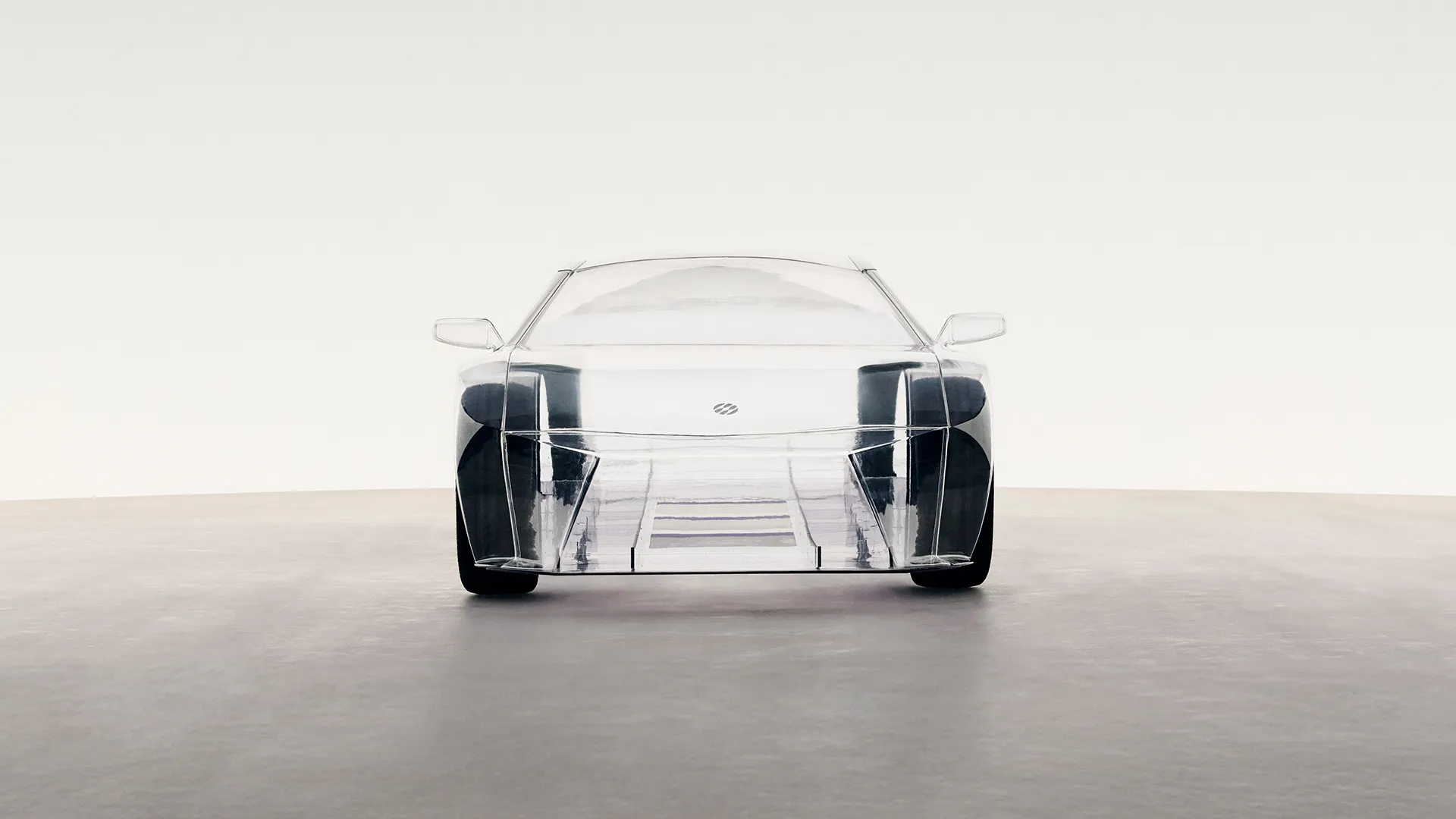 Front view of a transparent concept car showing internal structure and design.