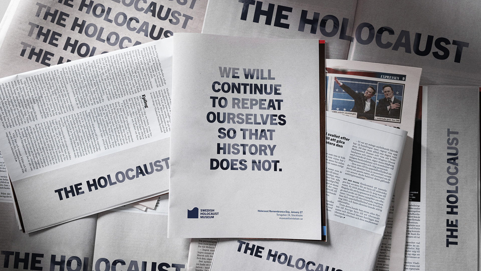 Swedish Holocaust Museum pamphlet with text 'We will continue to repeat ourselves so that history does not.' placed over newspapers with 'THE HOLOCAUST' headlines.
